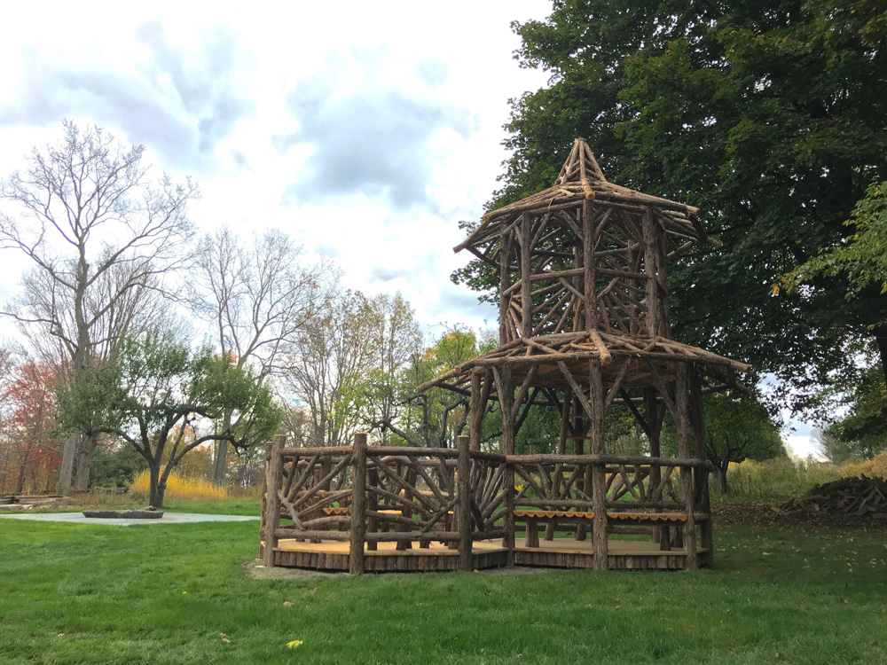 Natural wood two story gazebo built with trees and branches titled the Taunton Hill Tree Tower