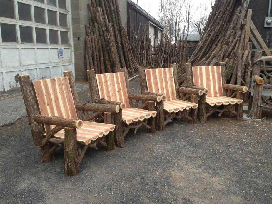 Outdoor rustic chairs built using natural cedar logs titled the Solid Back Chair Set