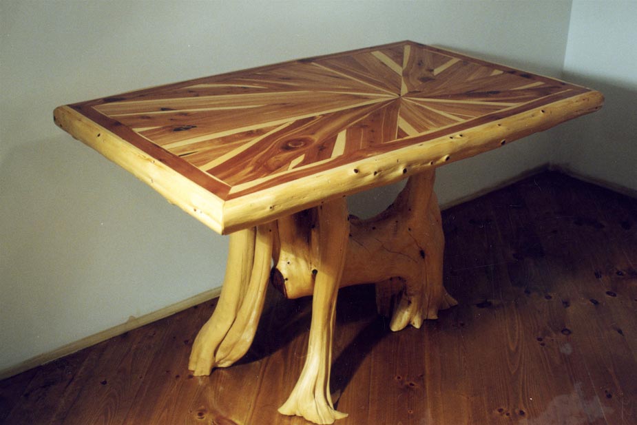 An entryway table built with stripped eastern red cedar trees