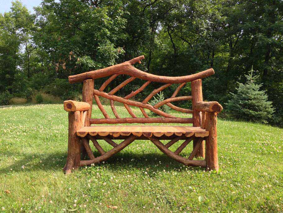Exterior twig bench built from cedar logs titled the Rhinebeck