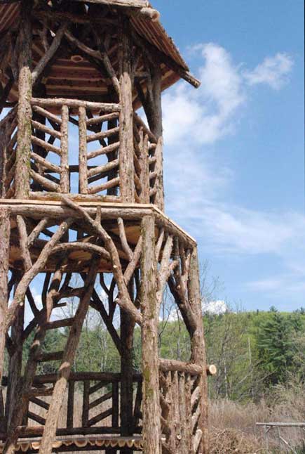 Outdoor rustic tree tower built using bark-on trees and branches constructed for the Strawbery Banke Museum